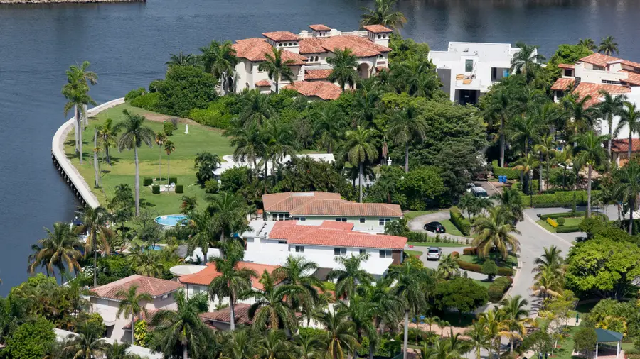 Custom pinellas county homes with concrete driveway and sidewalks