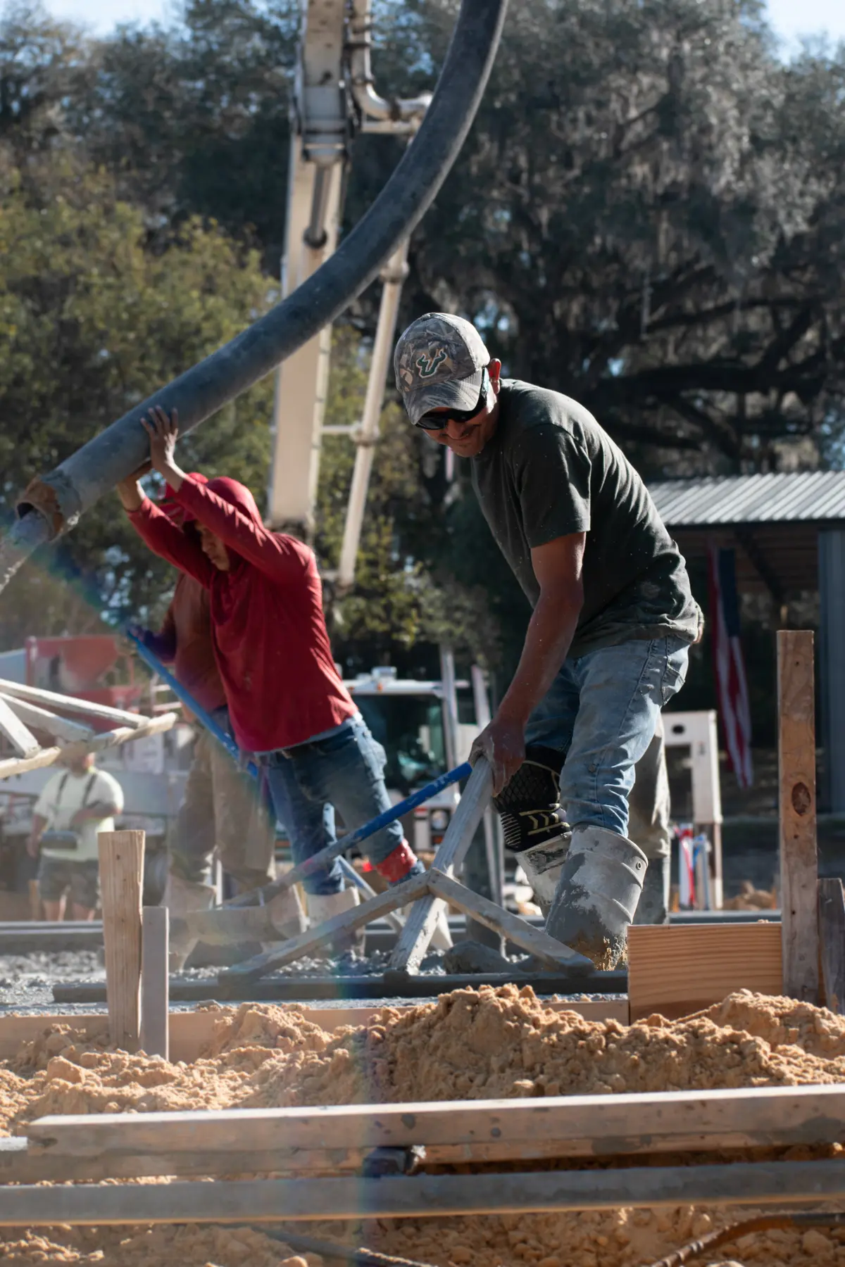 Total Concrete Services crew pouring a concrete foundation